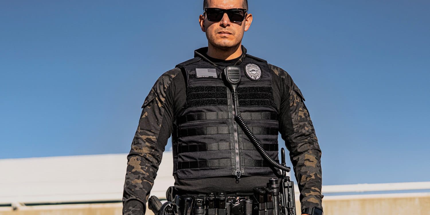 Police Officer wearing Patrol Bulletproof Vest in Black