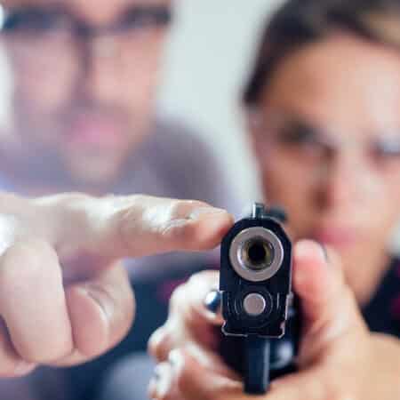 Women holding Pistol - Self Defense